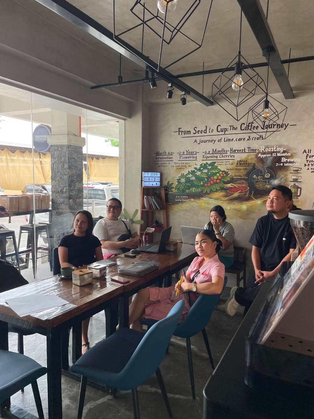 Business owners listening during the AI for Beginners class at Brewing Club Co. Cafe