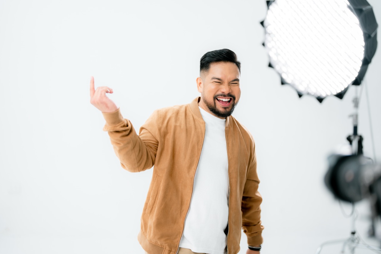 Dave Visaya laughing in the studio